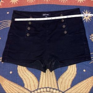Black stretchy hot shorts w/ nautical buttons